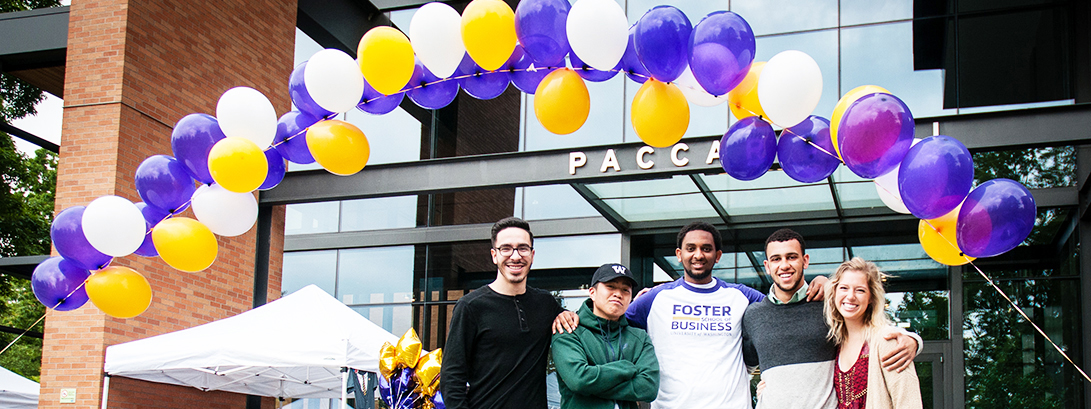 Foster students standing in front of PACCAR Hall during event