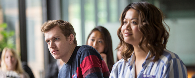 Foster students paying attention during presentation on campus