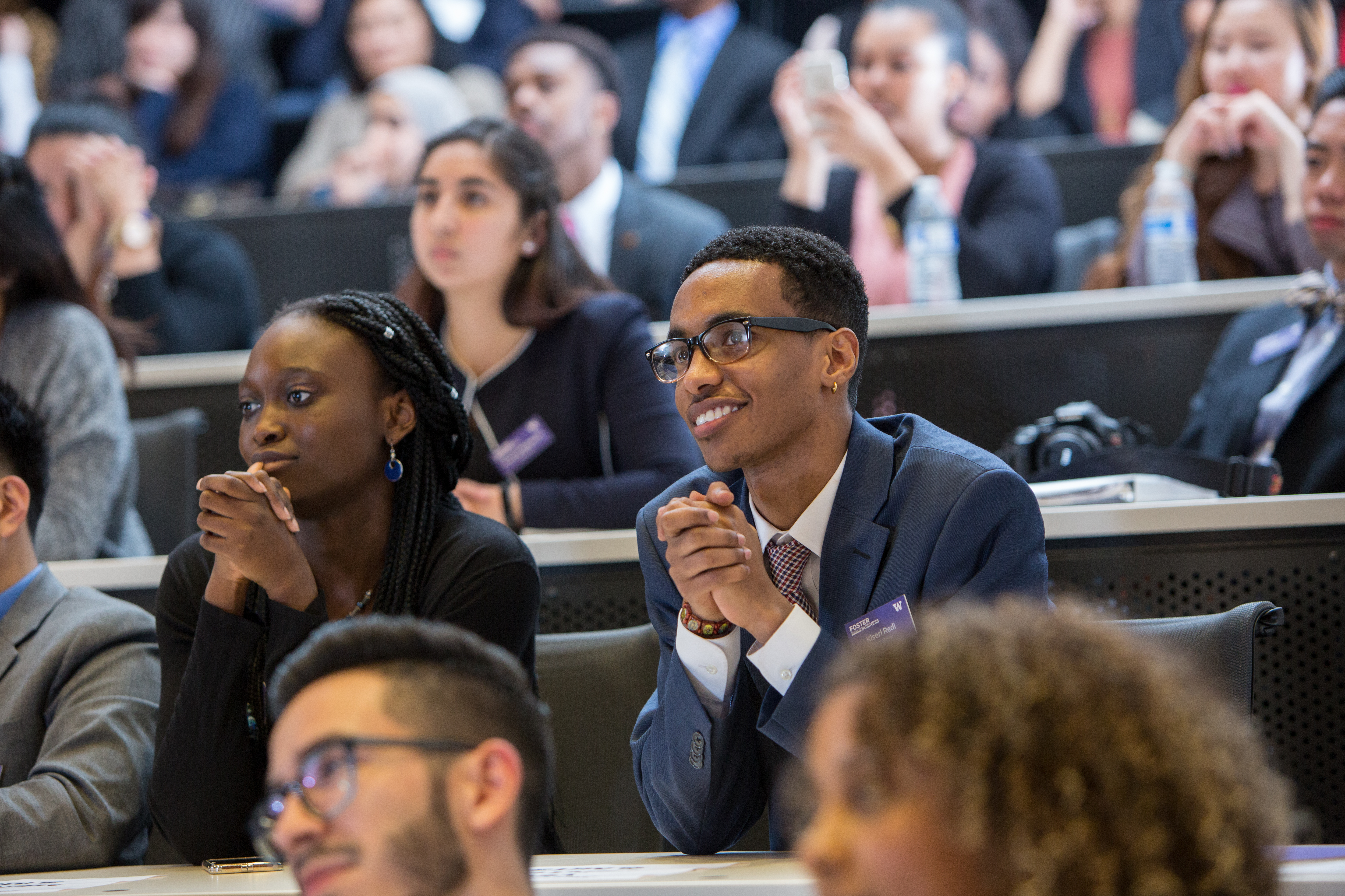 Foster undergrads listening to presentation