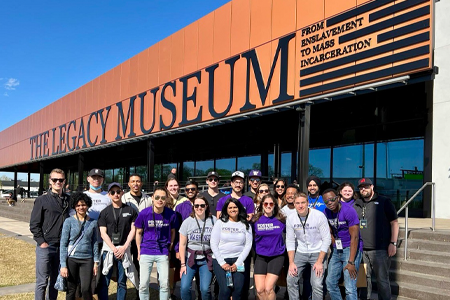 Students stnading in front of the legacy museum