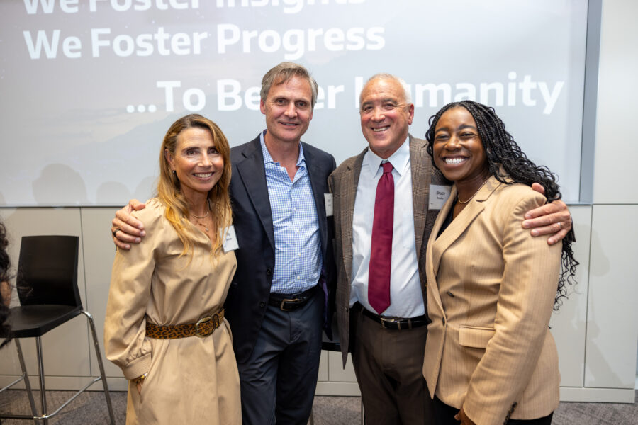 From left to right: Ally Svenson, Scott Svenson, Bruce Avolio, and Falesha Johnson at the end-of-year Fritzky dinner.