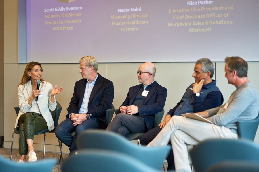 Ally Svenson (left) and Scott Svenson (right) hosting a panel discussion at the Foster School of Business AI Spark Day.