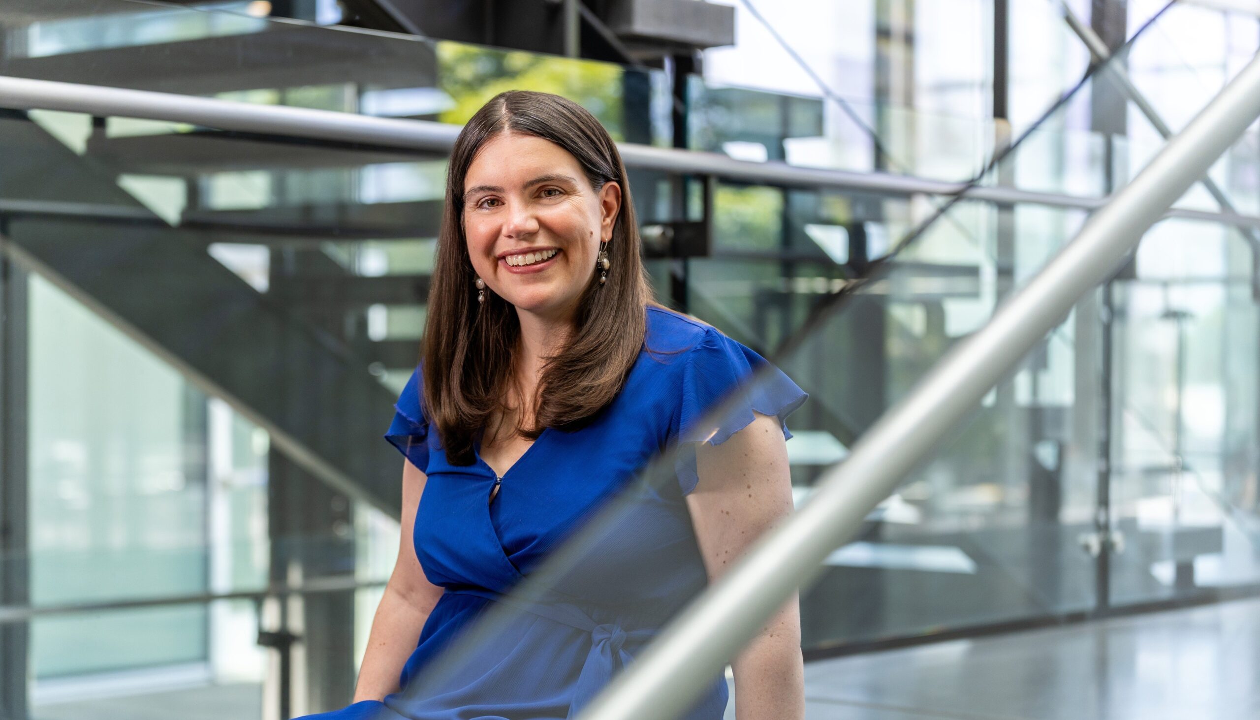 Alicia DeSantola on the University of Washington campus. DeSantola researches entrepreneurship, innovation, and how emerging industries navigate uncertainty.